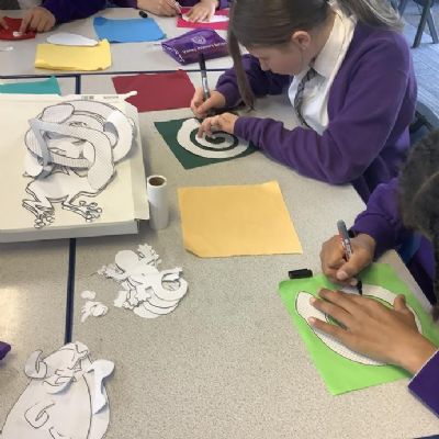 During DT lessons, we have designed a stuffed toy. We created a template, cut out the material and began to sew our stuffed toy.