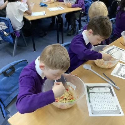 Year 3 have been working on their cookery skills. The children made a tasty African inspired couscous dish using chopping, grating and peeling techniques.