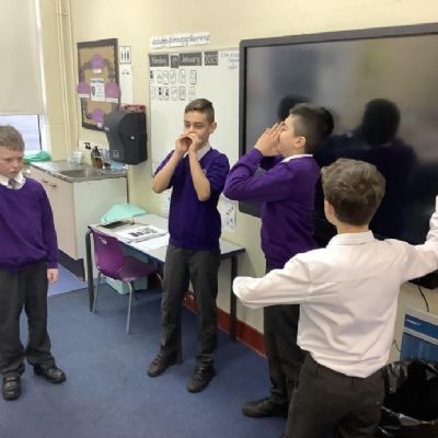 From reading our book, 'The Song From Somewhere Else', we made freeze frames of key parts in the book before completing our writing based on the character's experiences.